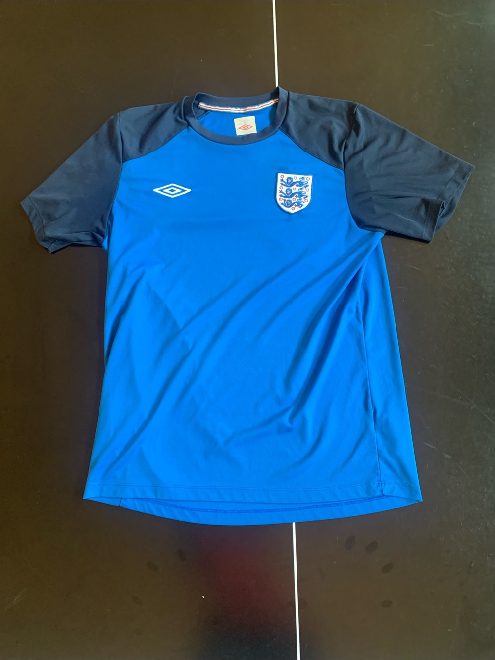 Umbro Kids Blue England Training Jersey with Navy Sleeves